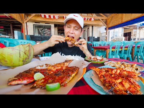 Preview image for the video "Famous Seafood in Bali!! 🦐 Grilled Fish + Shrimp at Jimbaran Beach - Bali, Indonesia!".