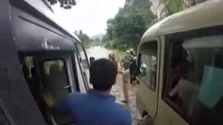 Preview image for the video "crossing a flooded street in vietnam".