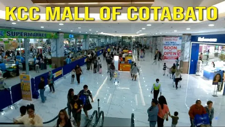 Preview image for the video "ഡ്രൈവിംഗ്, വാക്കിംഗ് ടൂർ: കെസിസി മാൾ ഓഫ് കോട്ടബാറ്റോ സിറ്റി – പാർക്കിംഗ് ലോട്ടിൽ നിന്ന് സൂപ്പർമാർക്കറ്റിലേക്കുള്ള നടത്തം".