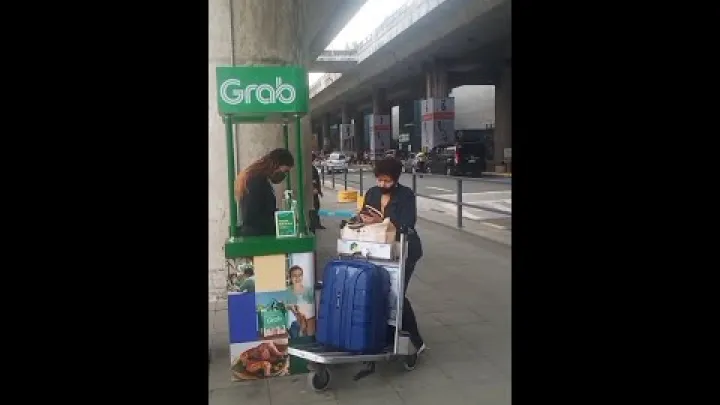 Preview image for the video "نحوه استفاده از غرفه Grab در ترمینال ۳ فرودگاه NAIA (فرودگاه بین‌المللی نینوی آکوئینو - مترو مانیل) - اکتبر ۲۰۲۲".