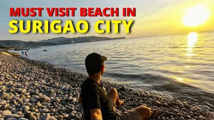 Preview image for the video "Mabua Pebble Beach, Surigao City, Surigao del Norte | Ferðaáætlun og ferðamyndband".