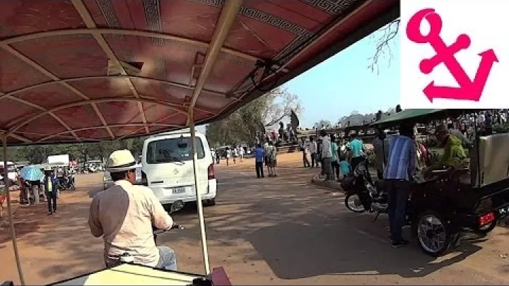 Preview image for the video "Widok z pokładu - Przejażdżka tuk-tukiem Siem Reap (ul. Jean Commaille) do Angkor Wat w Kambodża".