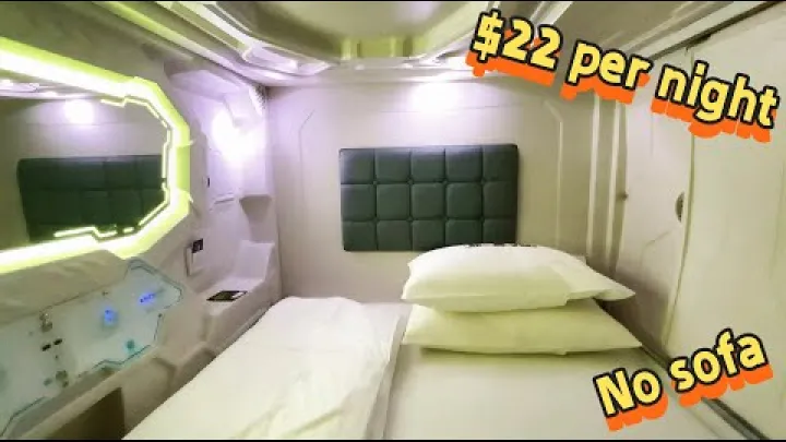 Preview image for the video "Bermalam di Lapangan Terbang Wuhan, Republik Rakyat China: Pod Tidur dan Pengangkutan Tanpa Pemandu Sepenuhnya".