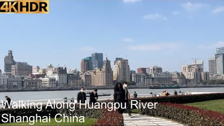Preview image for the video "Berjalan di Sepanjang Sungai Huangpu | Shanghai, Republik Rakyat China | 4K HDR".
