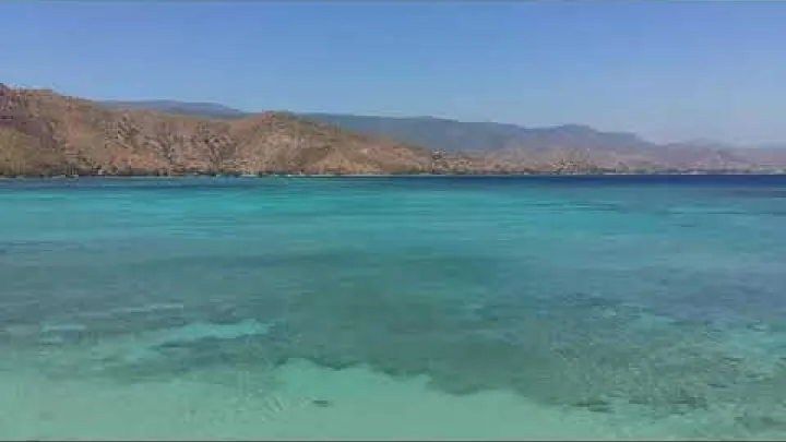 Preview image for the video "Areia Branca, Dili, Timor Est".